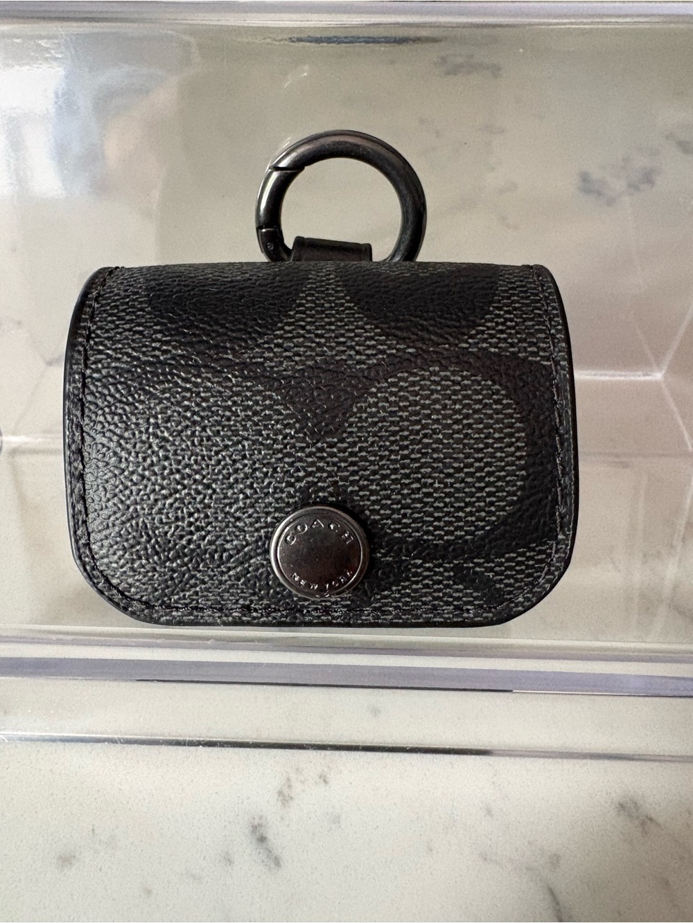 Coach Large Wireless Earbud Case in Signature C Pattern.